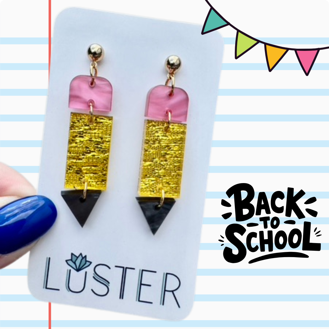 Colorful pencil earrings on a Luster branded card with 'Back to School' text.