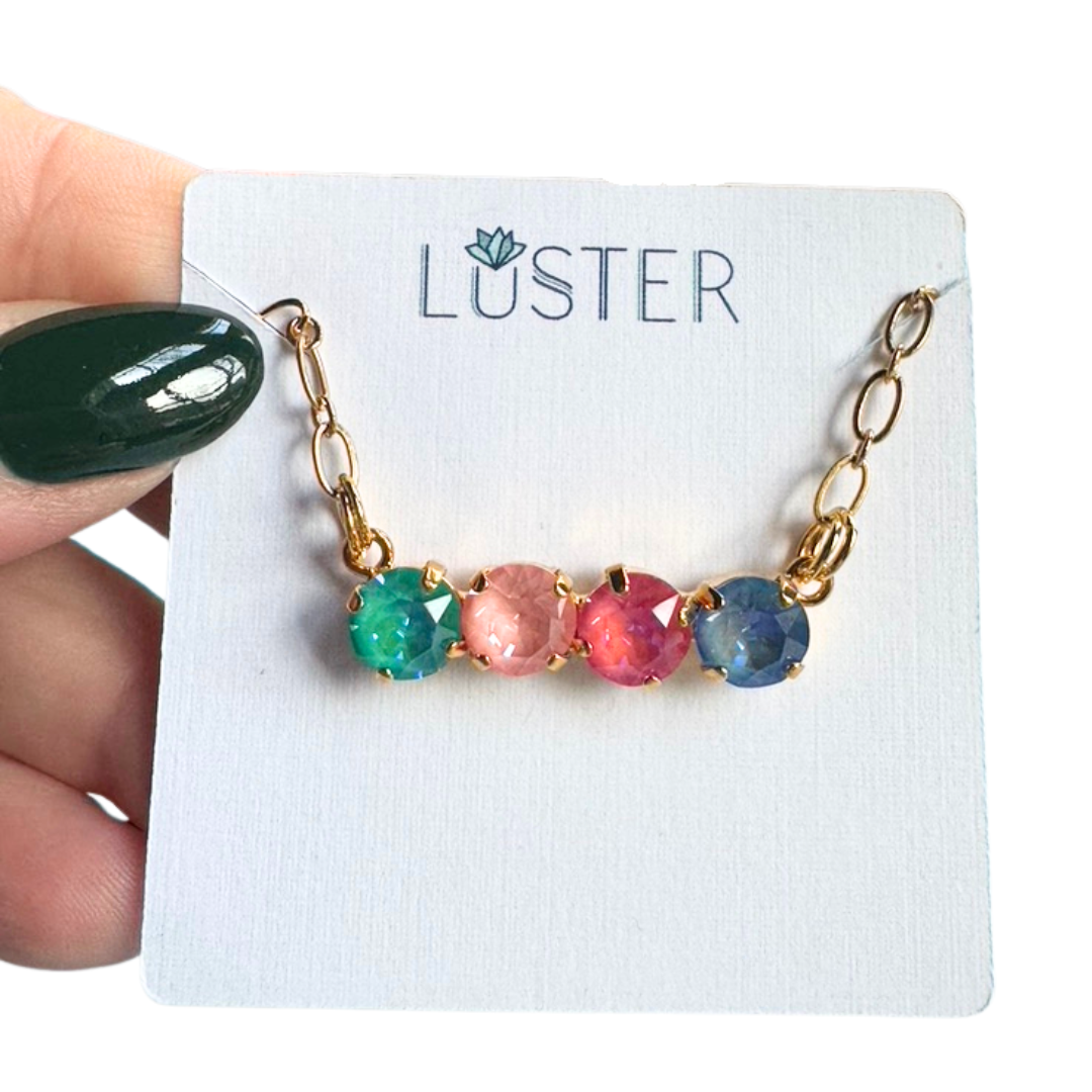 Bracelet with colorful crystals on a 'Luster' branded card