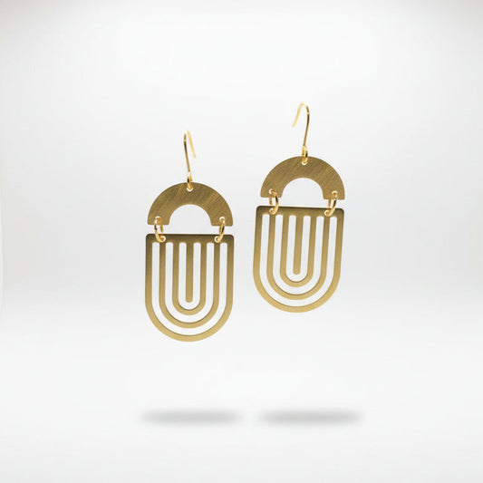 Gold earrings on a white background