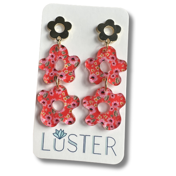 Floral earrings on a Luster branded card