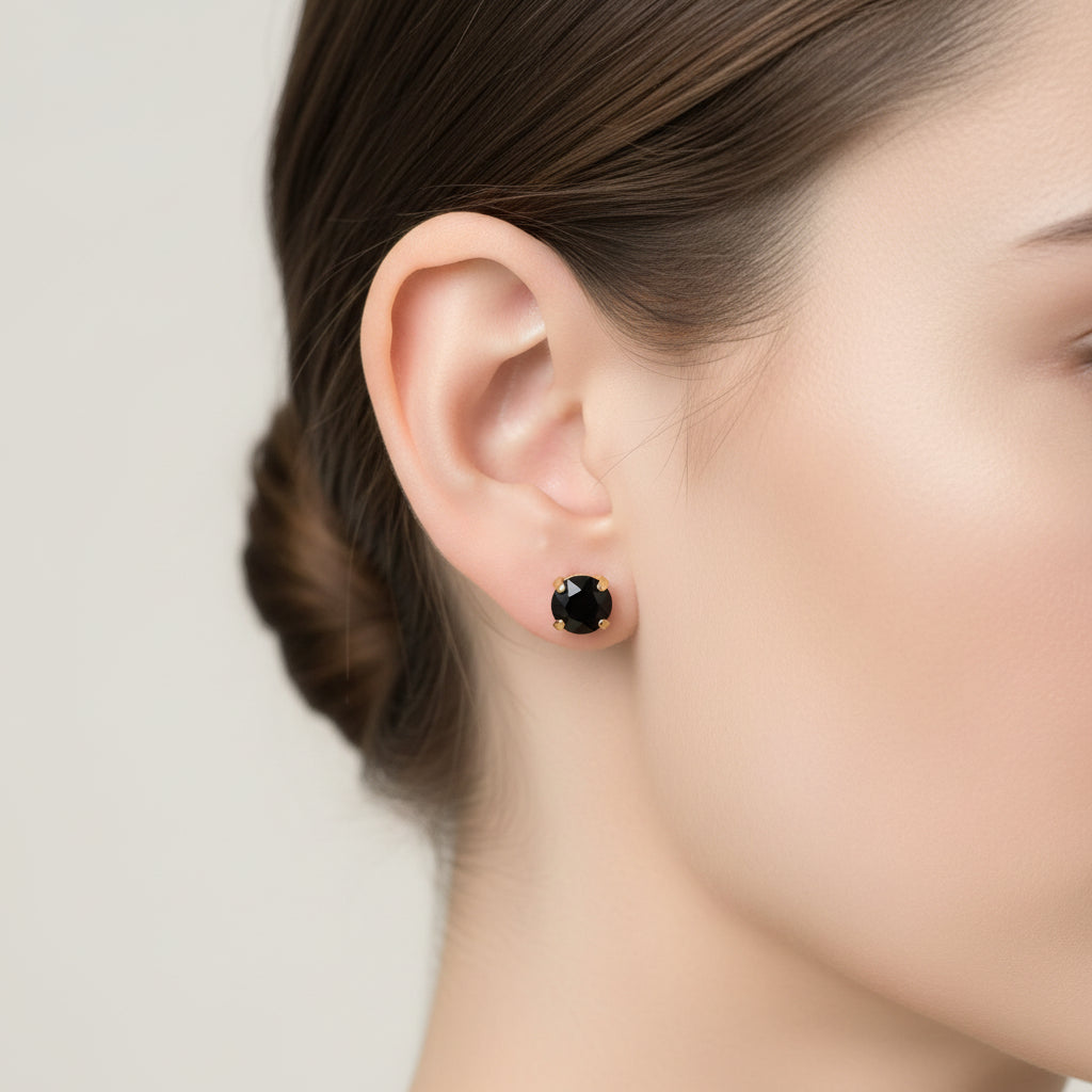 Black crystal earrings shown on a model