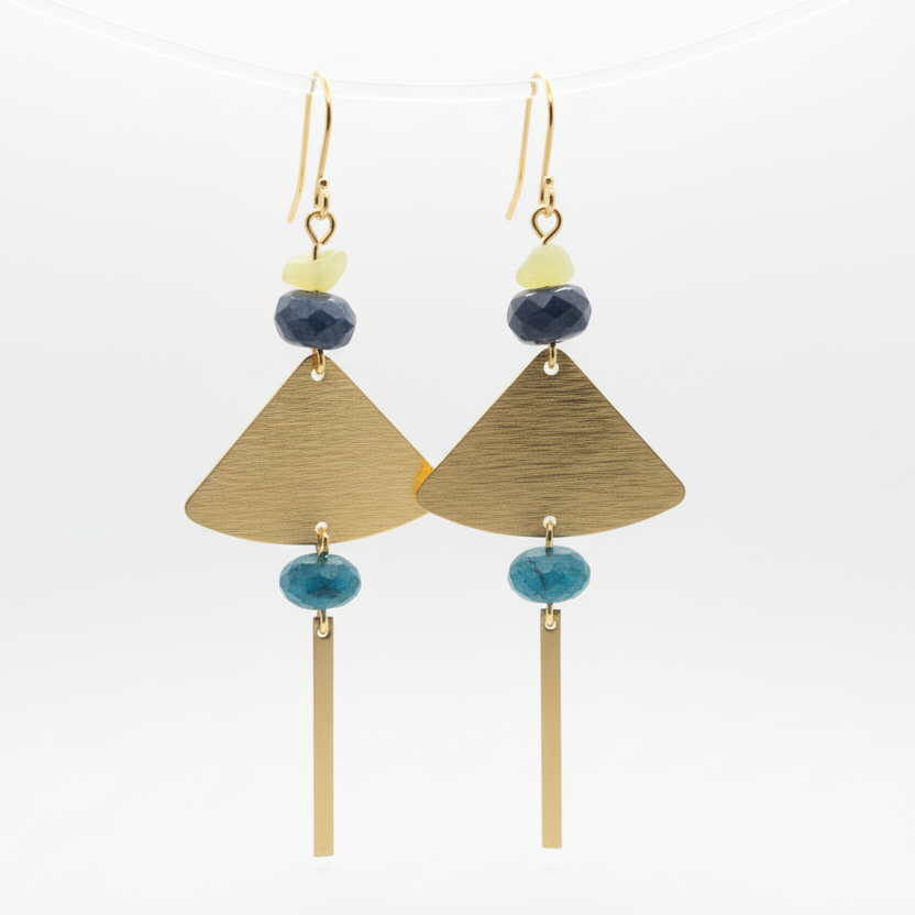 Pair of gold and blue and green stone earrings on a white background